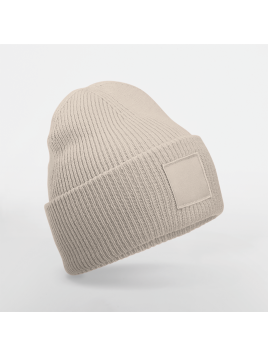 Bonnet à large revers avec patch ton sur ton